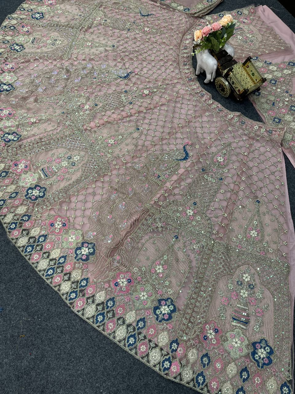 Light Pink Color Soft Net Sequence Work Lehenga Choli