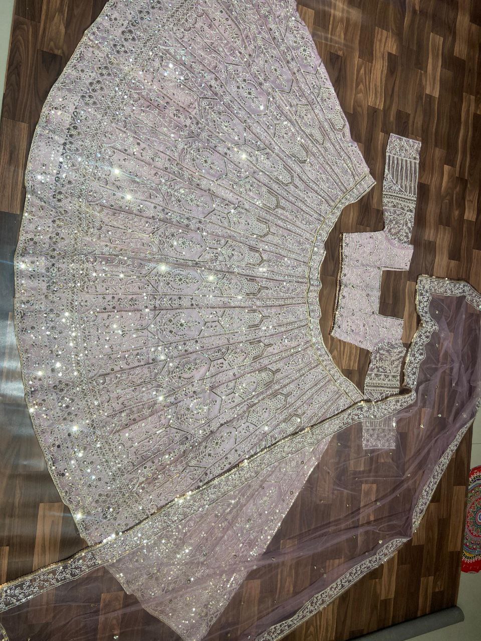 Light Color Net Heavy Sequence Work Lehenga Choli