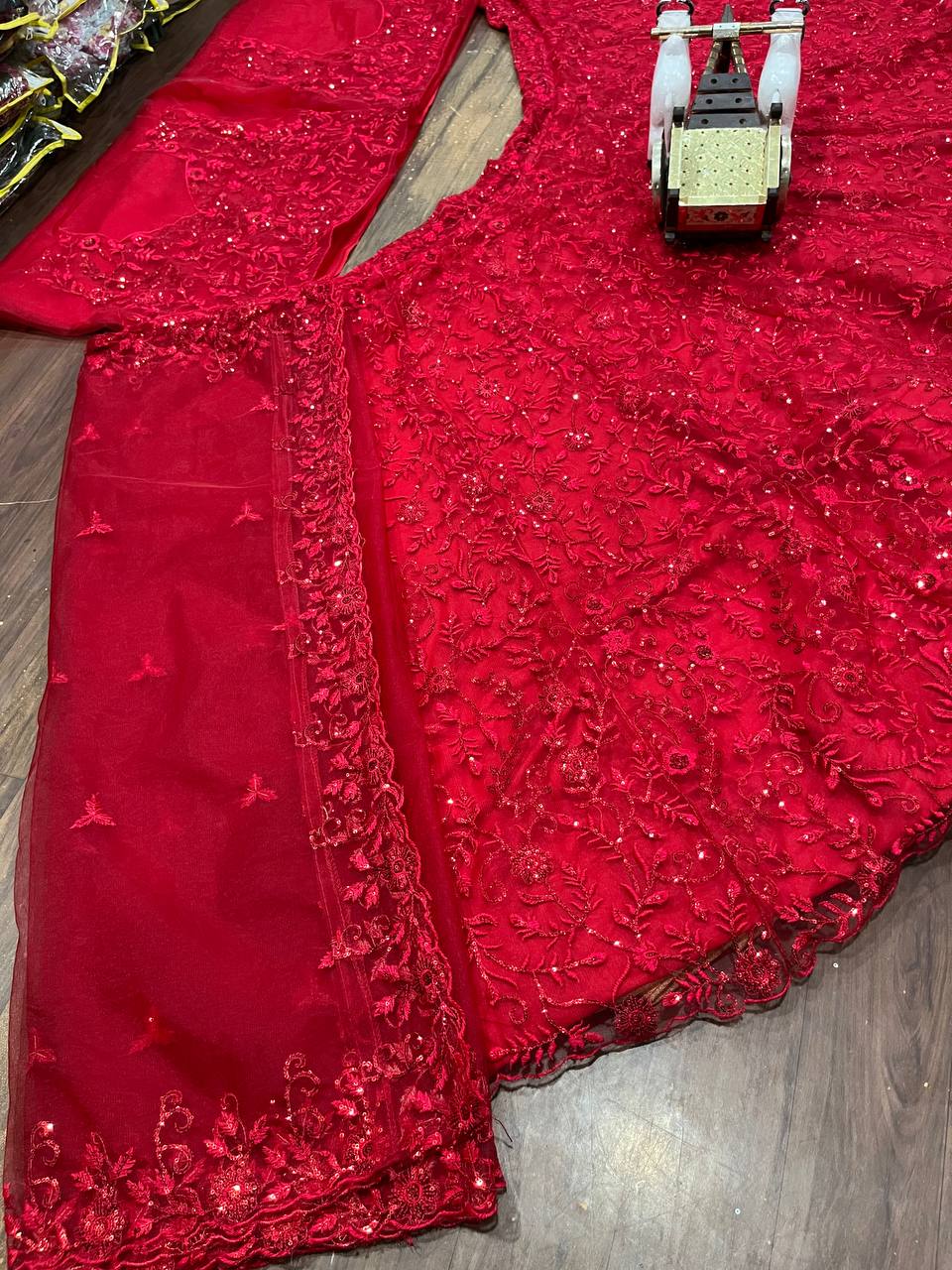 Red Color Net Semi Stitched Lehenga Choli