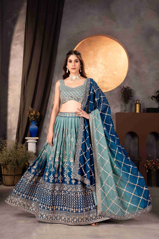 Attractive Teal Blue Embroidered Reception Wear Lehenga Choli With Dupatta
