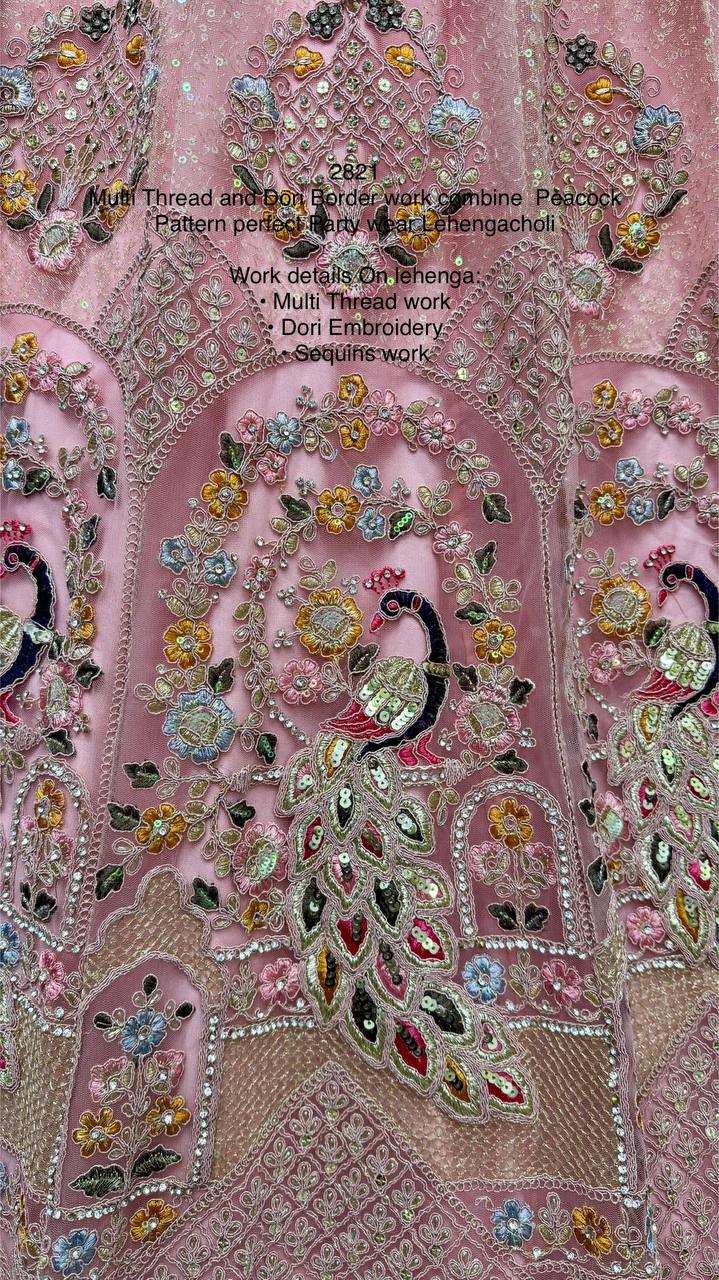 Peach Soft Net Weddding Wear Lehenga Choli