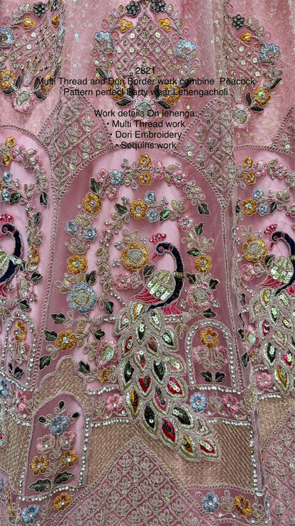 Peach Soft Net Weddding Wear Lehenga Choli