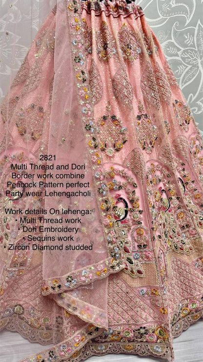 Peach Soft Net Weddding Wear Lehenga Choli