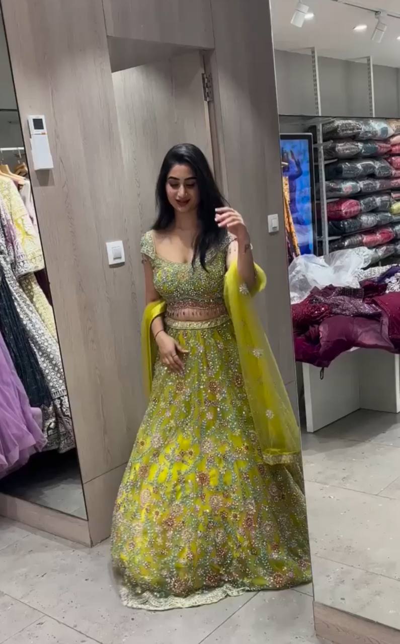Green Color Soft Net Real Mirror Work Mehndi Wear Lehenga