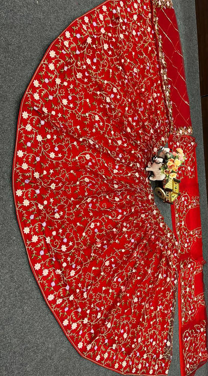 Red Color Soft Net Floral Work Lehenga Choli