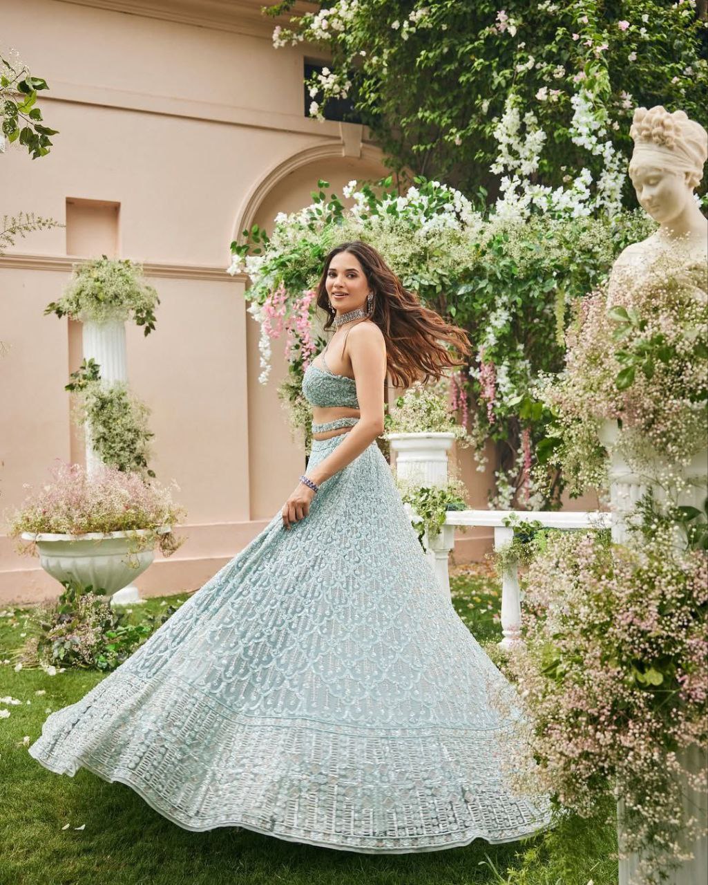Sea Green Net Sequence Work Lehenga Choli