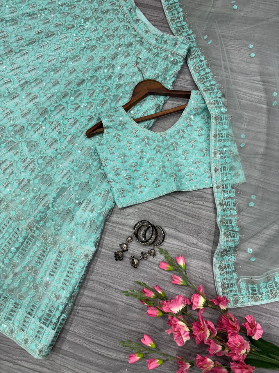 Sea Green Net Sequence Work Lehenga Choli
