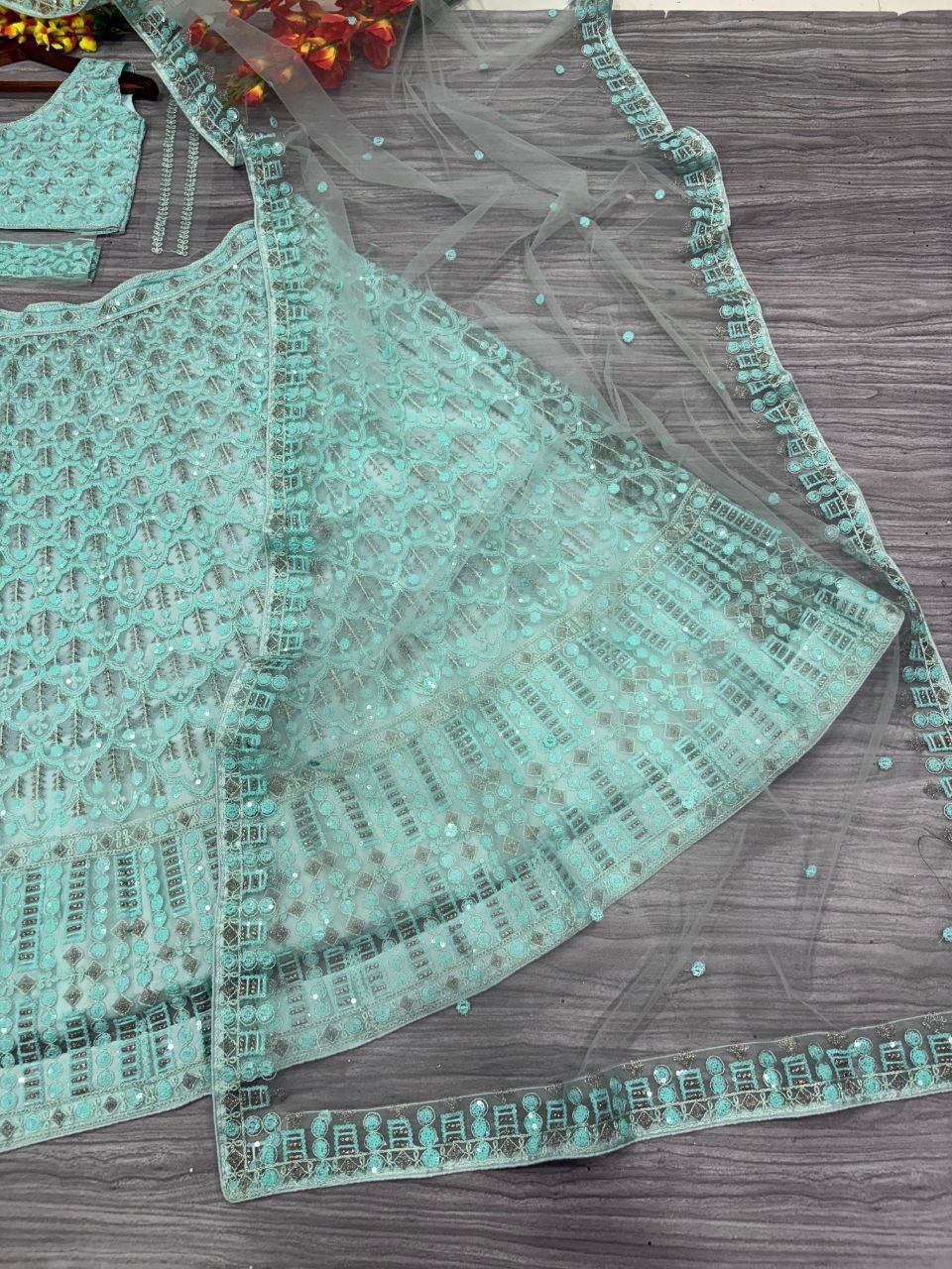 Sea Green Net Sequence Work Lehenga Choli
