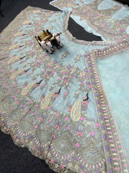 Sky Color Soft Net Coding Embroidered Work Peacock Design Lehenga Choli