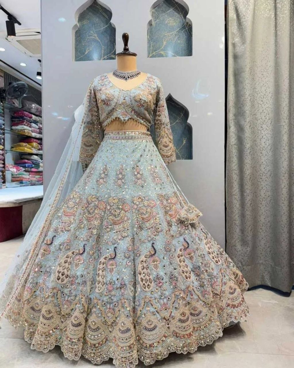 Sky Color Soft Net Coding Embroidered Work Peacock Design Lehenga Choli