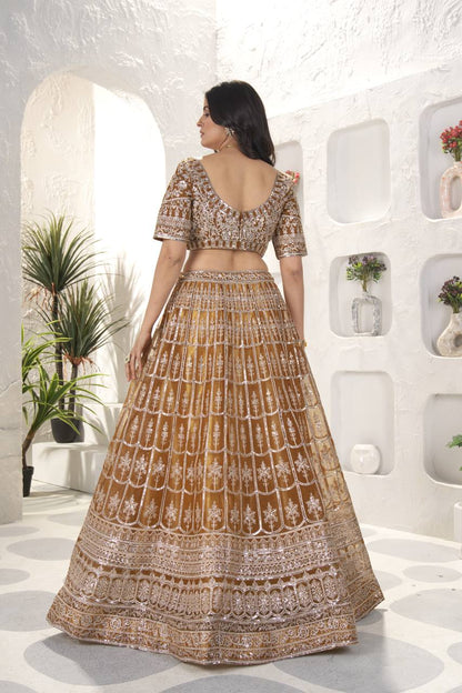 Rust Color Soft Net Sequence Work Lehenga Choli