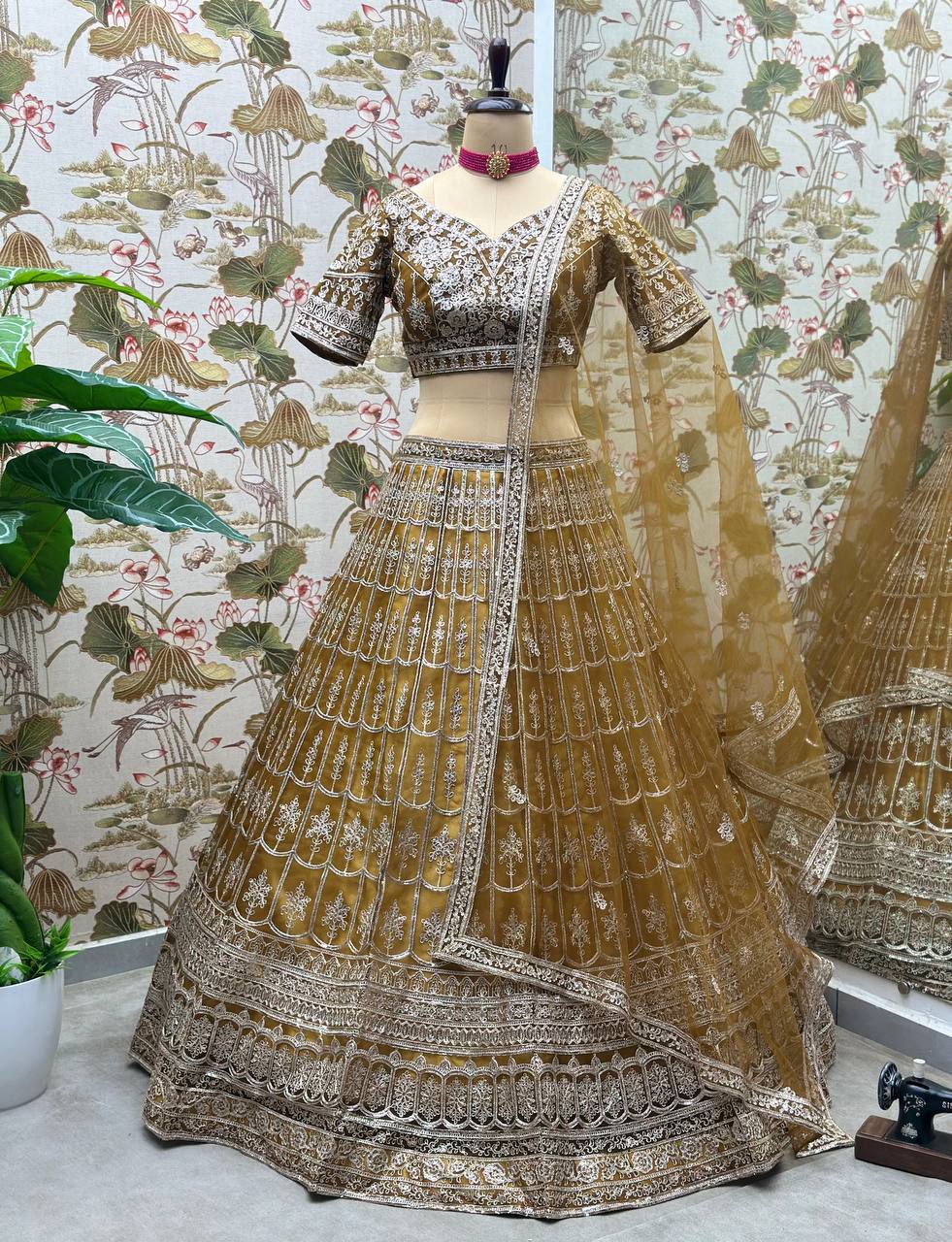 Rust Color Soft Net Sequence Work Lehenga Choli