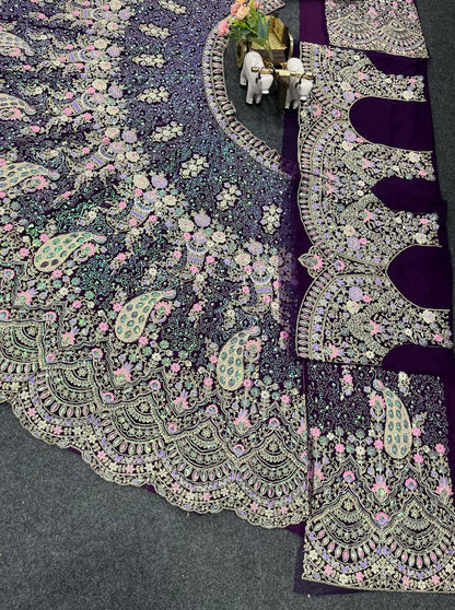 Wine Color Soft Net Heavy Embroidered Lehenga Choli