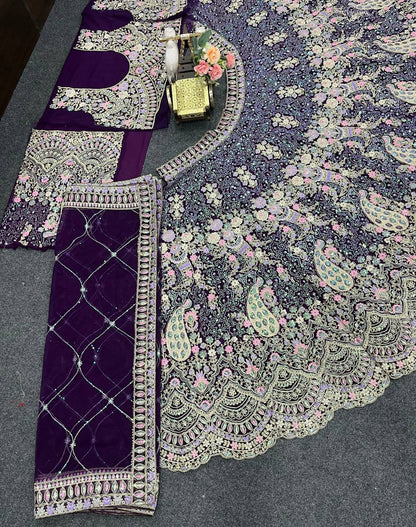 Wine Color Soft Net Heavy Embroidered Lehenga Choli